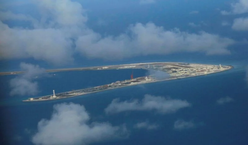 China Sends Naval Forces to Monitor US Warship Near Disputed Shoal