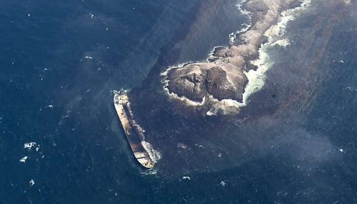 Aerial photograph of Caroline Bezengi grounded near Al Qibliyah, published by Oman MTCIT on 23 August 2026. Acquisition date not supplied; this is not a current view of the casualty.